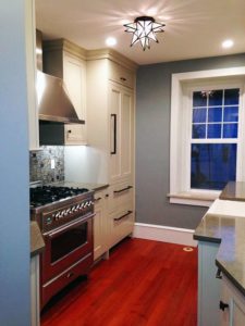 Kitchen remodeling project with wooden floor and white cabinets | MTP Construction in Mt. Laurel, NJ