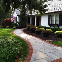 Exterior brick and concrete walkway connecting porch to driveway | MTP Construction in Mt. Laurel, NJ